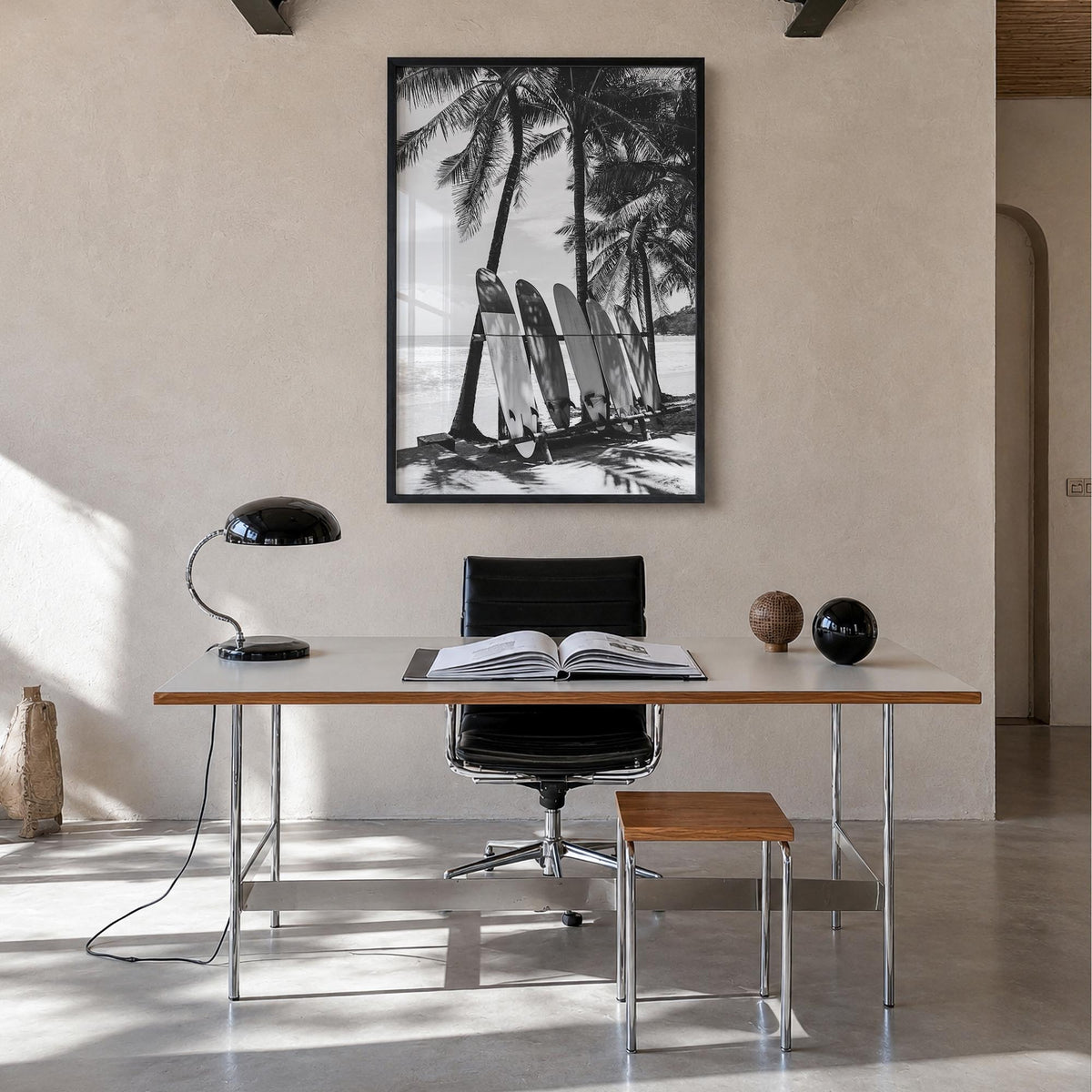 Surfboard no. 2 black & white photo poster – vertical wall art in black wood frame, hanging on wall