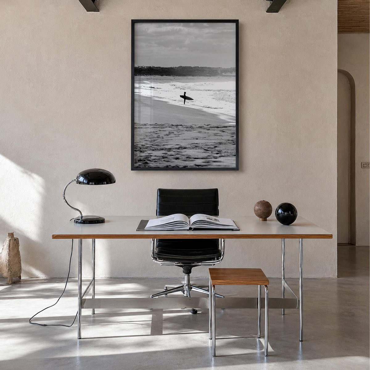 Surfer no. 3 black & white photo poster – vertical wall art in black wood frame, hanging on wall