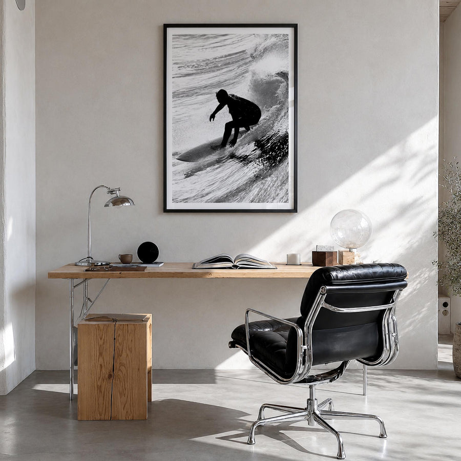 Surfer no. 5 black & white photo poster – vertical wall art in black wood frame with white border, hanging on wall