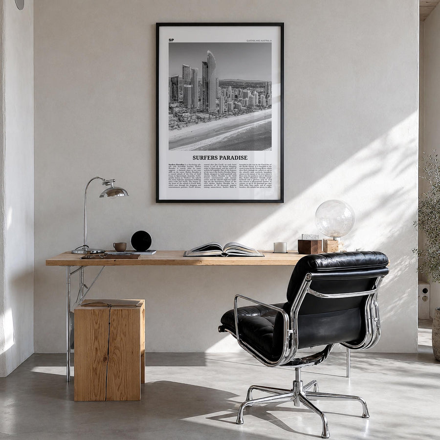 Surfers Paradise black & white newspaper poster of Australia – vertical wall art in black wood frame, hanging on wall