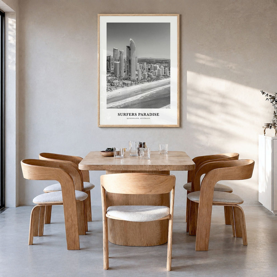 Surfers Paradise Classic Poster in a natural wood frame, hanging in a dining room