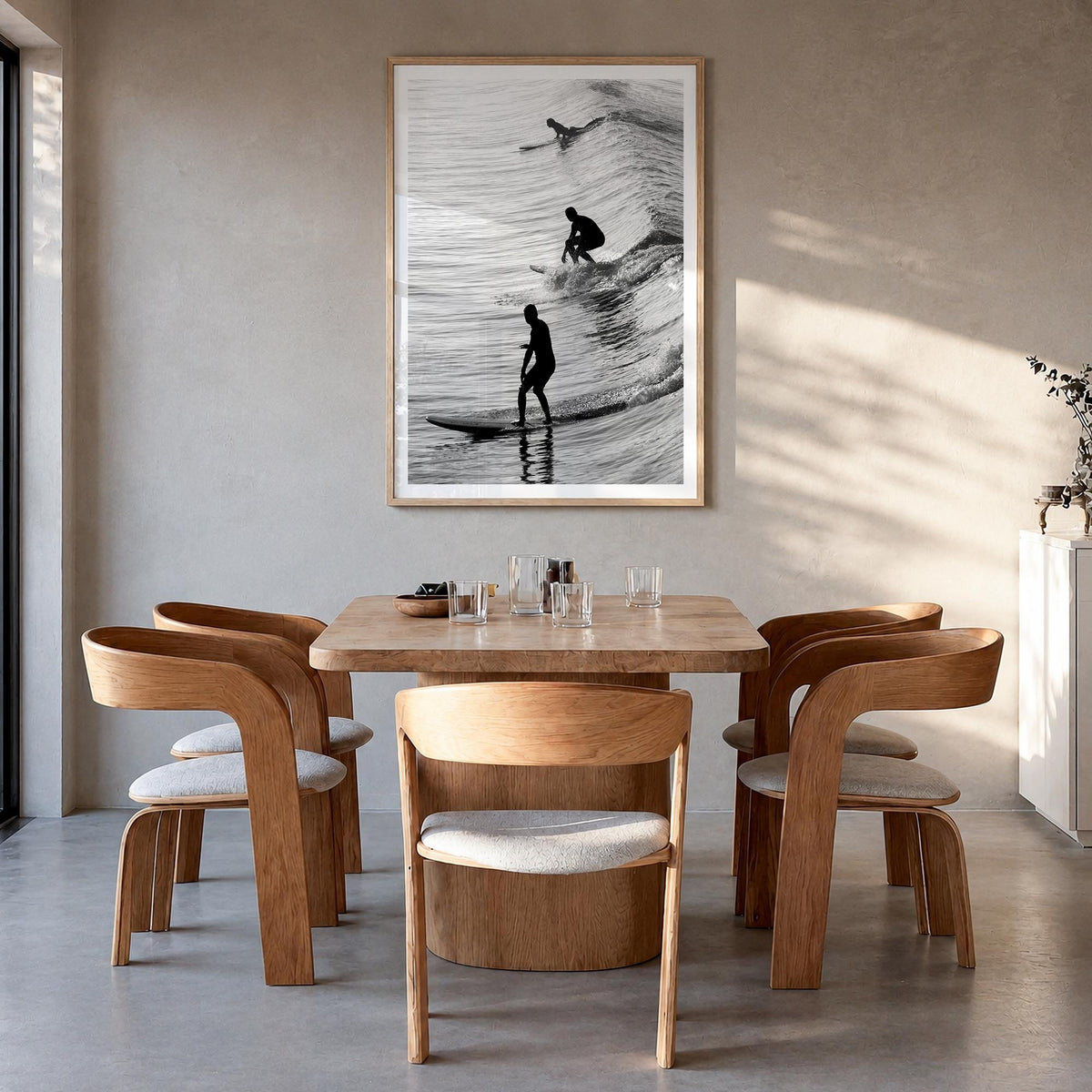 Surfing no. 2 black & white photo poster – vertical wall art in natural wood frame with white border, hanging on wall