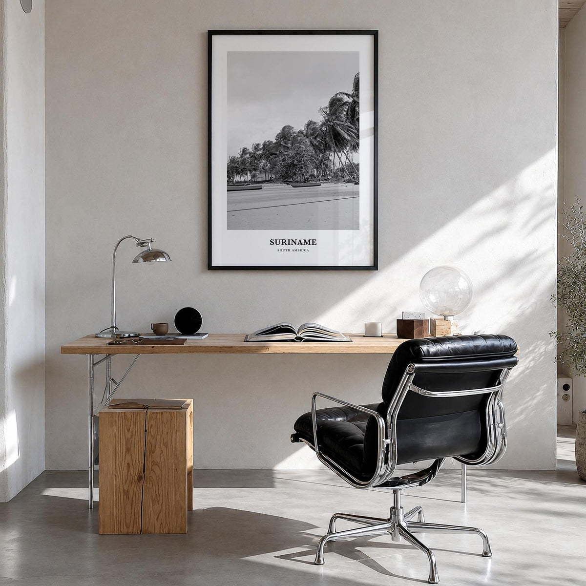 Suriname black & white classic poster of South America – vertical wall art in black wood frame, hanging on wall