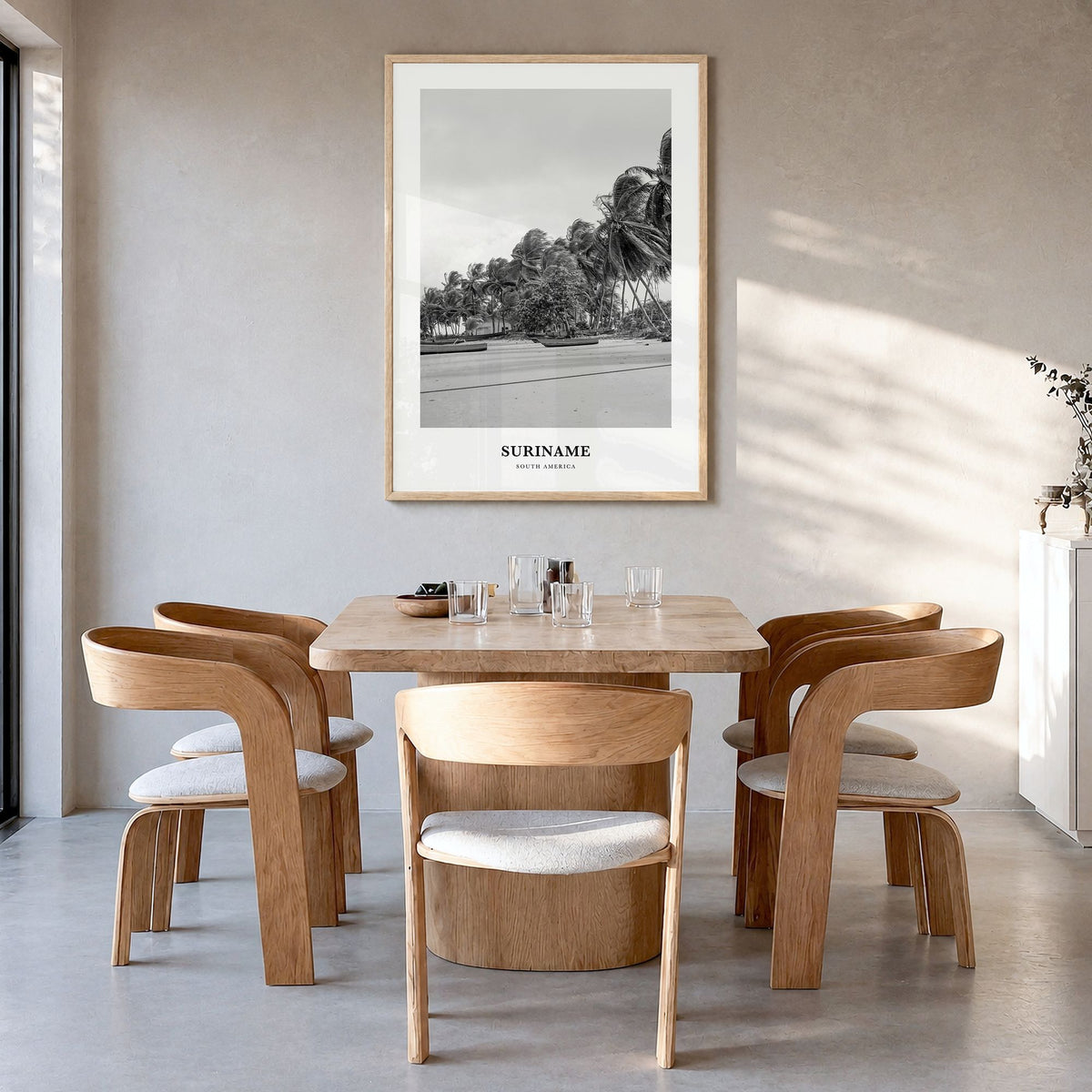 Suriname Classic Poster in a natural wood frame, hanging in a dining room