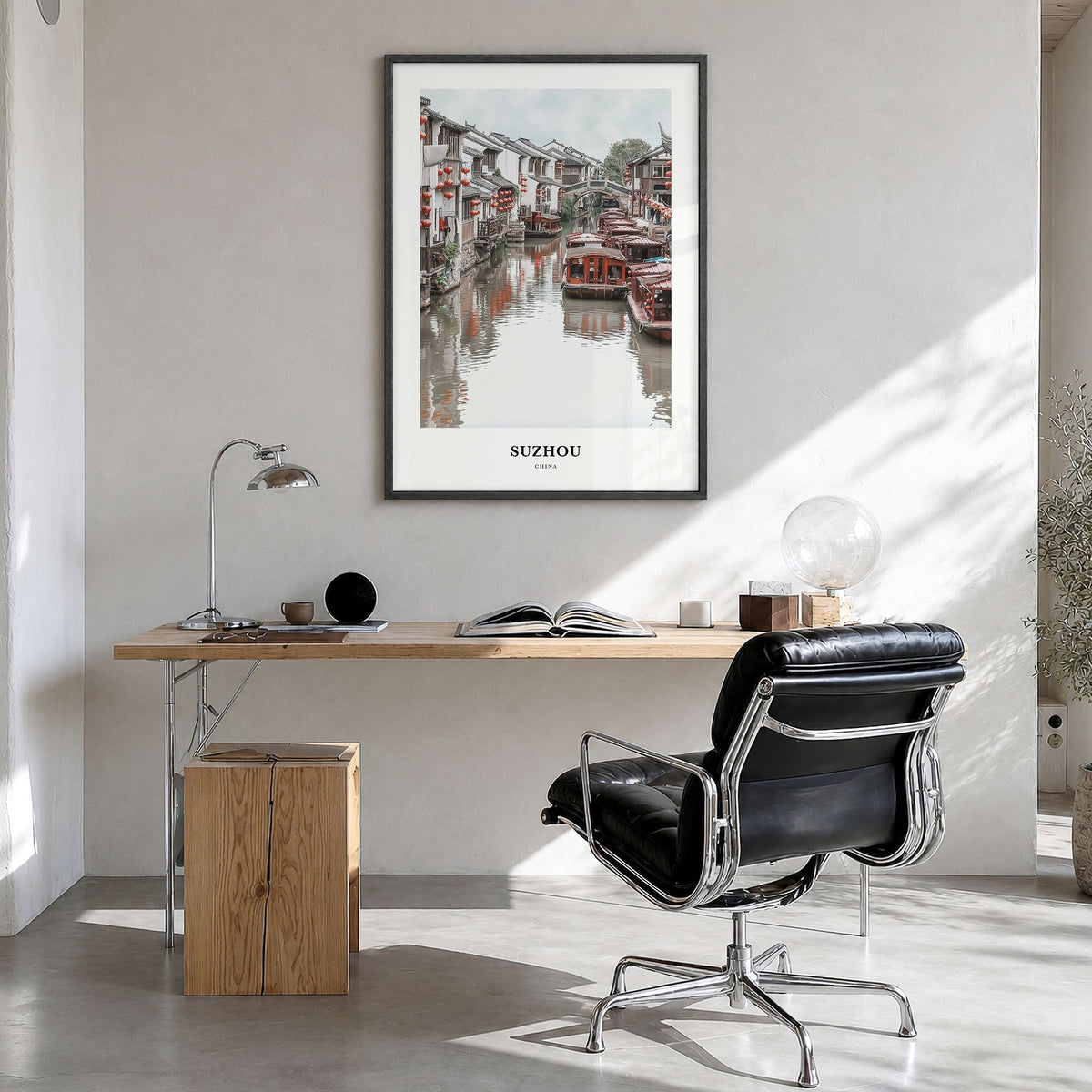 Suzhou Classic Poster in a black wood frame, hanging in a bright home office