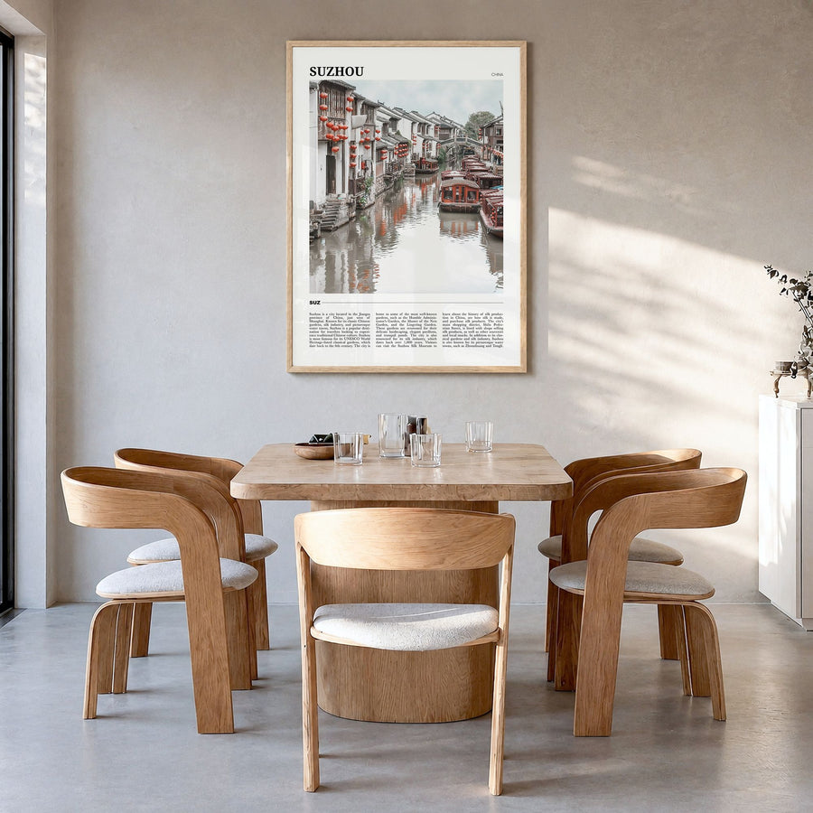 Suzhou Travel Poster in a natural wood frame, hanging in a dining room