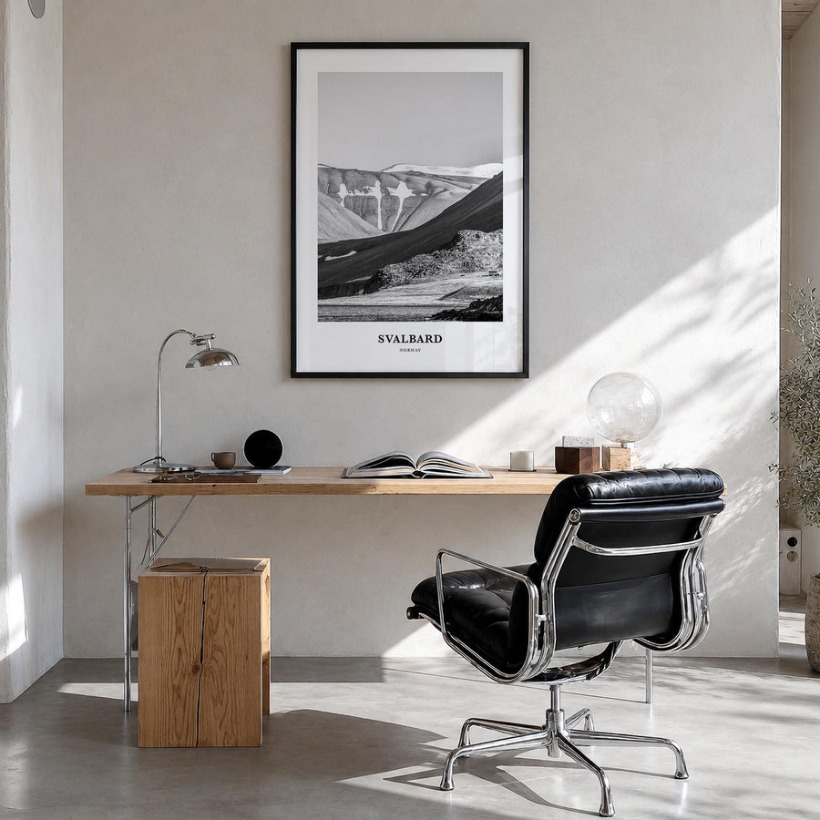 Svalbard black & white classic poster of Norway – vertical wall art in black wood frame, hanging on wall