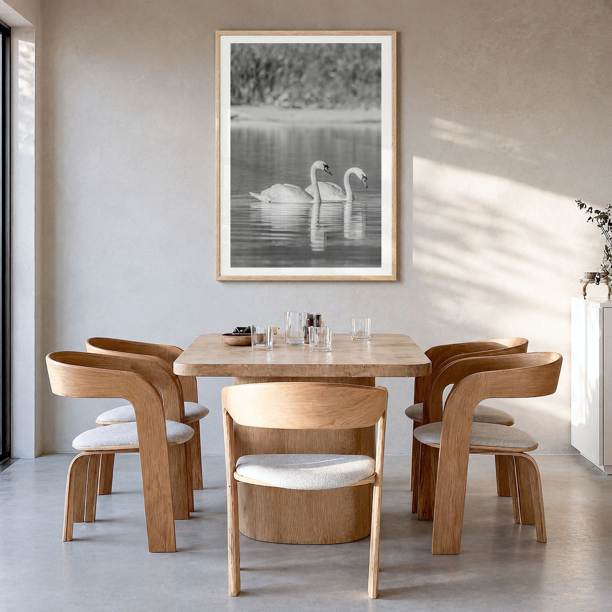 Swan Lake Photo No 2 Poster in a natural wood frame, hanging in a dining room, white border