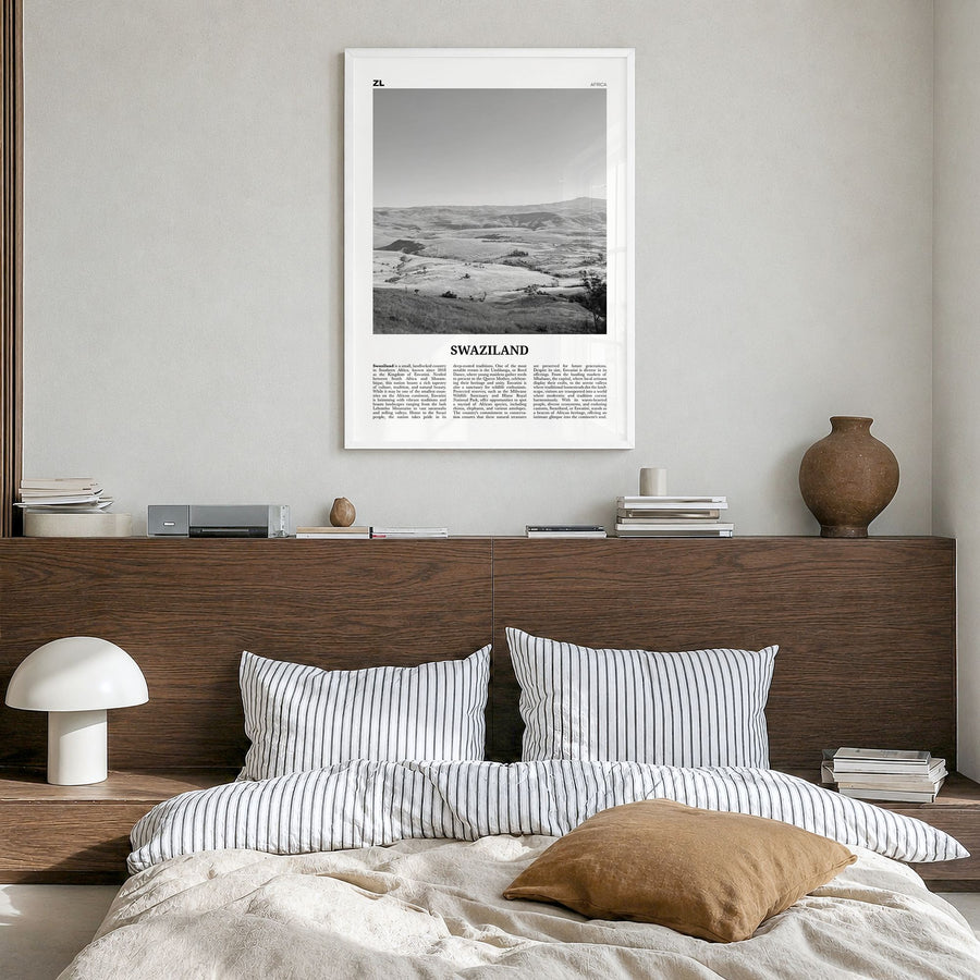 Swaziland Newspaper Poster in a white wood frame, hanging in a bedroom