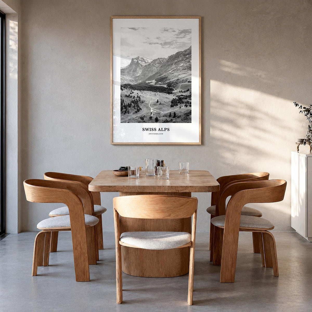 Swiss Alps black & white classic poster of Switzerland – vertical wall art in natural wood frame, hanging on wall