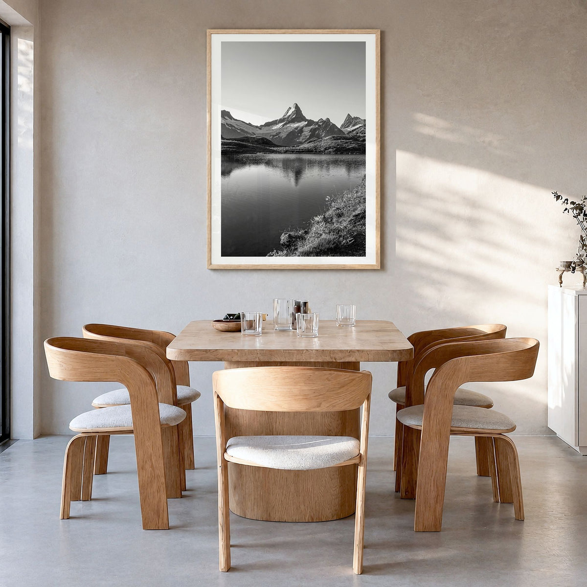 Switzerland Photo Poster in a natural wood frame, hanging in a dining room, white border