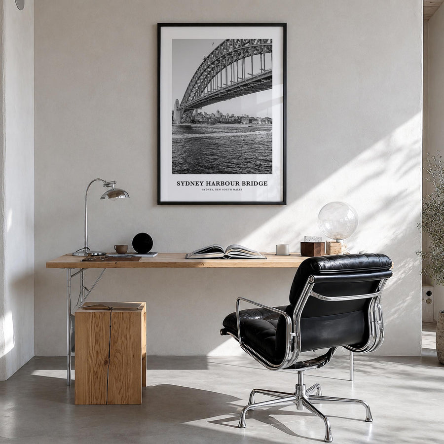 Sydney Harbour Bridge black & white classic poster of Australia – vertical wall art in black wood frame, hanging on wall