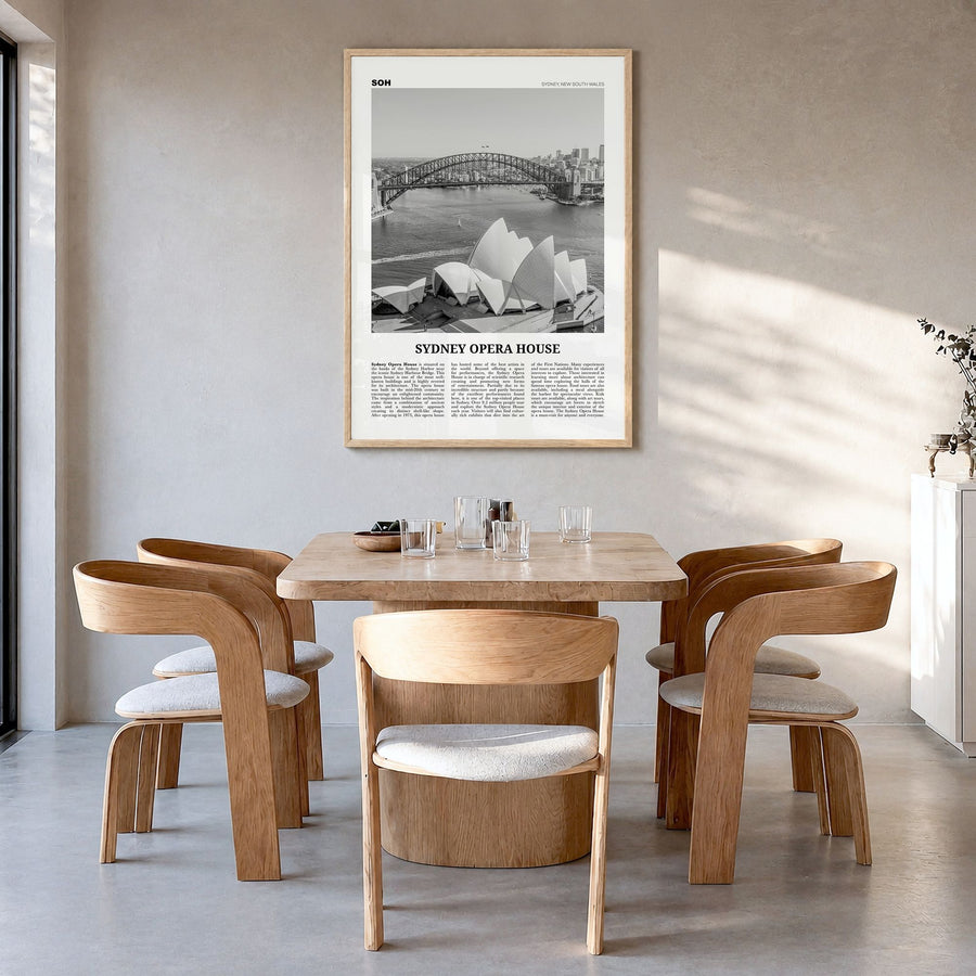Sydney Opera House Newspaper Poster in a natural wood frame, hanging in a dining room