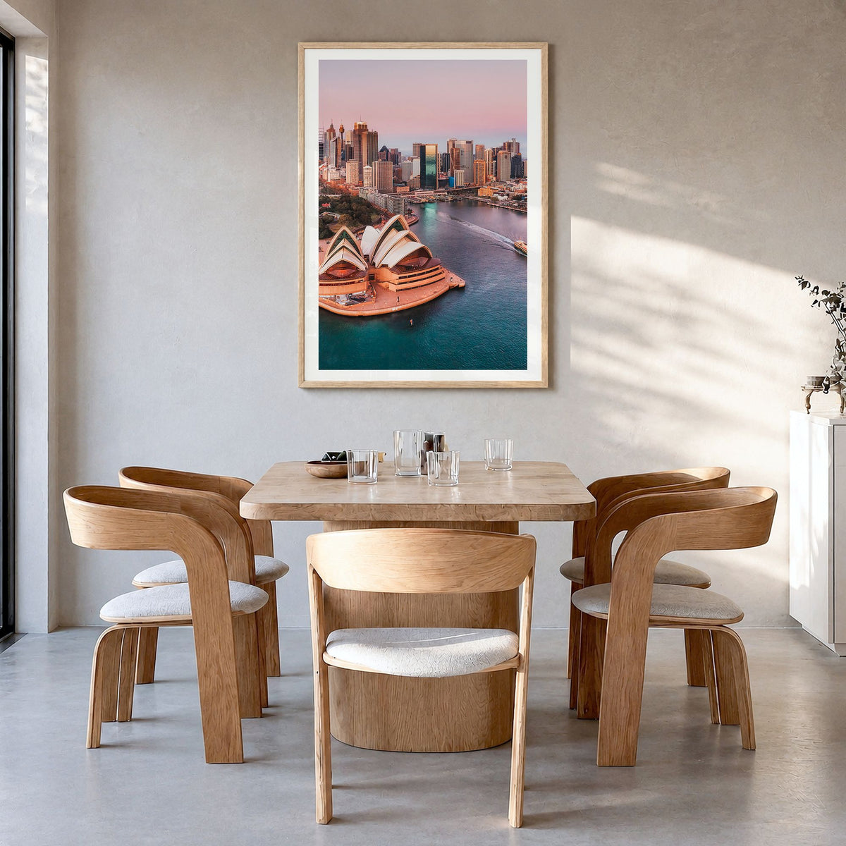 Sydney Photo No 1 Poster in a natural wood frame, hanging in a dining room, white border