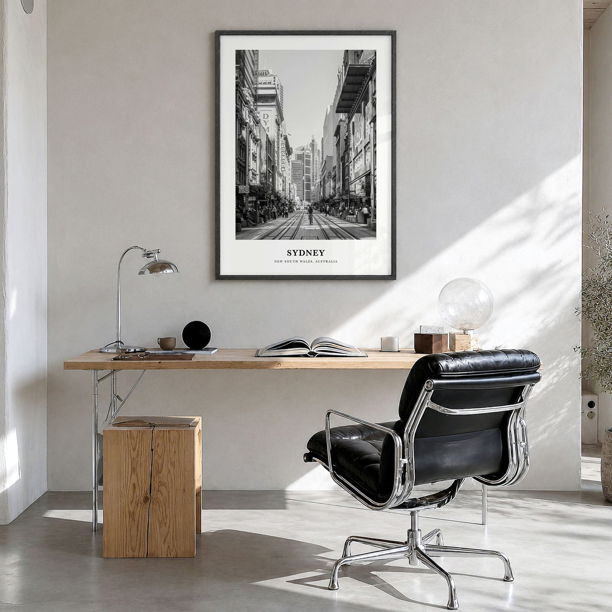 Sydney Classic No 1 Poster in a black wood frame, hanging in a bright home office
