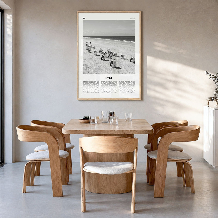 Sylt Newspaper Poster in a natural wood frame, hanging in a dining room