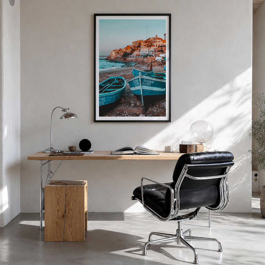 Taghazout colorful photo poster of Morocco – vertical wall art in black wood frame with white border, hanging on wall