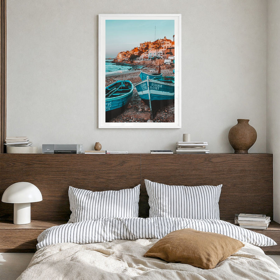 Taghazout Photo Poster in a white wood frame, hanging in a bedroom, white border