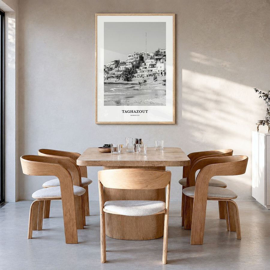Taghazout Classic Poster in a natural wood frame, hanging in a dining room