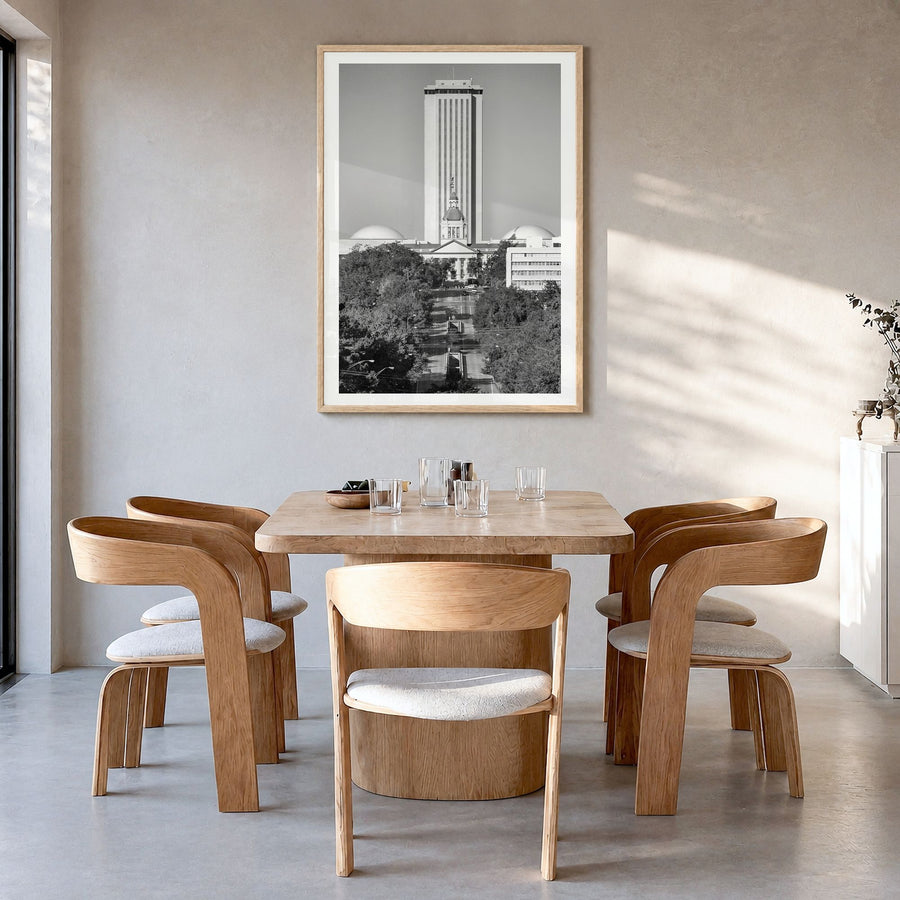 Tallahassee Photo Poster in a natural wood frame, hanging in a dining room, white border