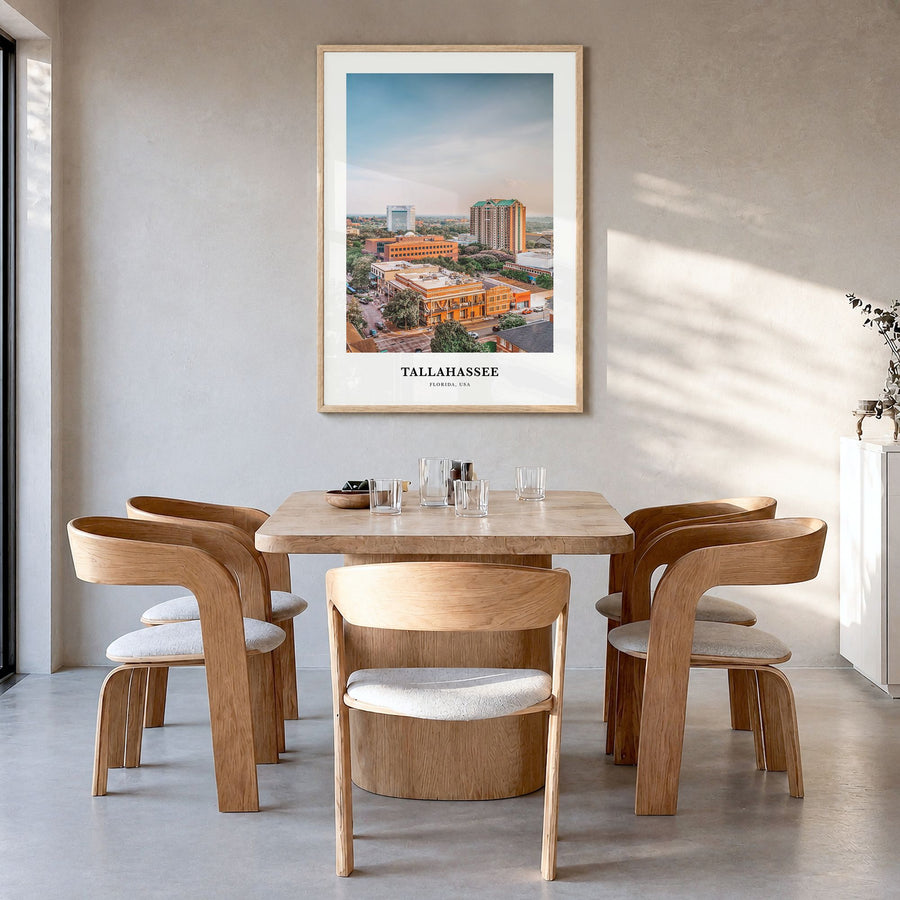 Tallahassee Classic Poster in a natural wood frame, hanging in a dining room