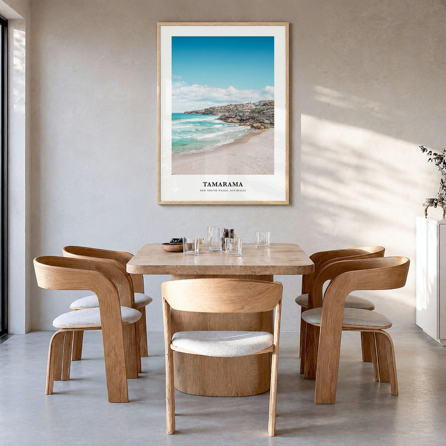 Tamarama Classic Poster in a natural wood frame, hanging in a dining room