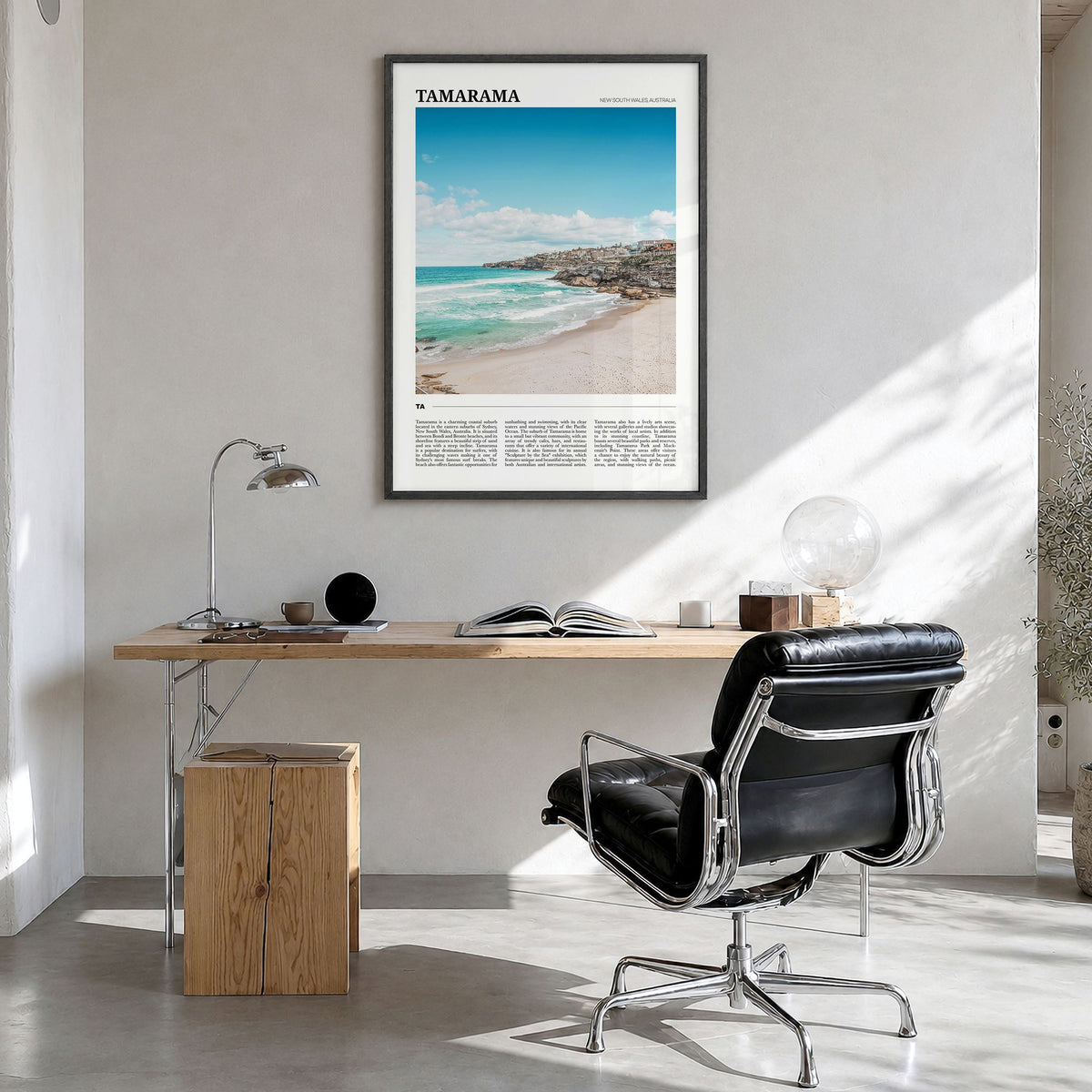 Tamarama Travel Poster in a black wood frame, hanging in a bright home office