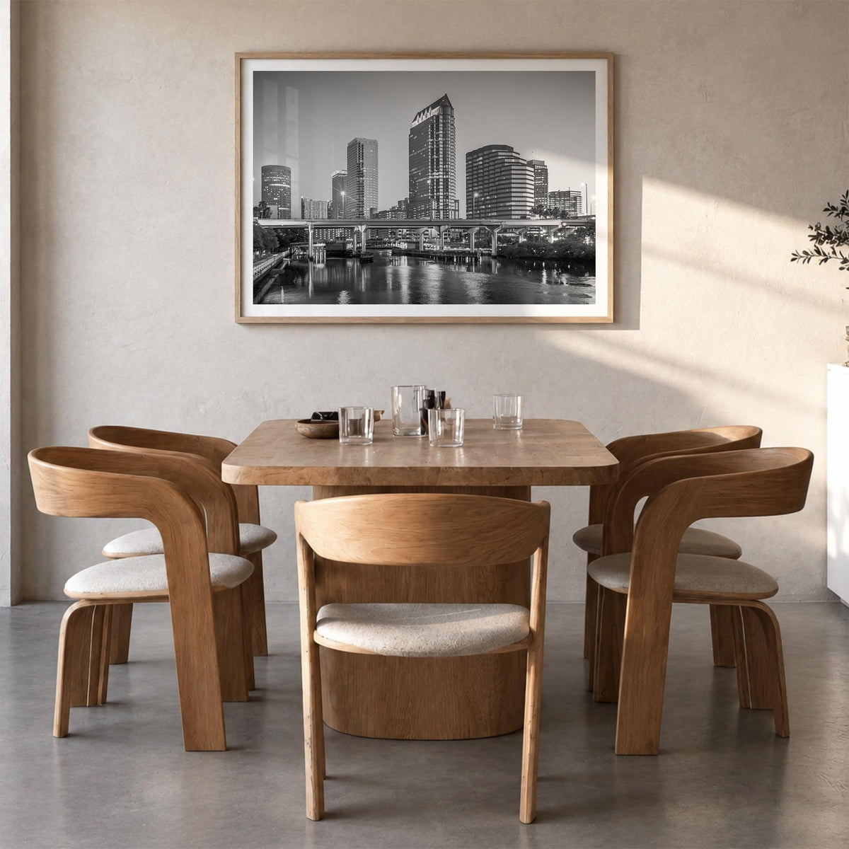 Tampa black & white photo poster of Florida, USA – horizontal wall art in natural wood frame with white border, hanging on wa