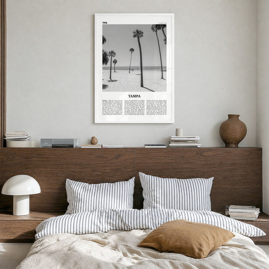 Tampa Newspaper No 2 Poster in a white wood frame, hanging in a bedroom