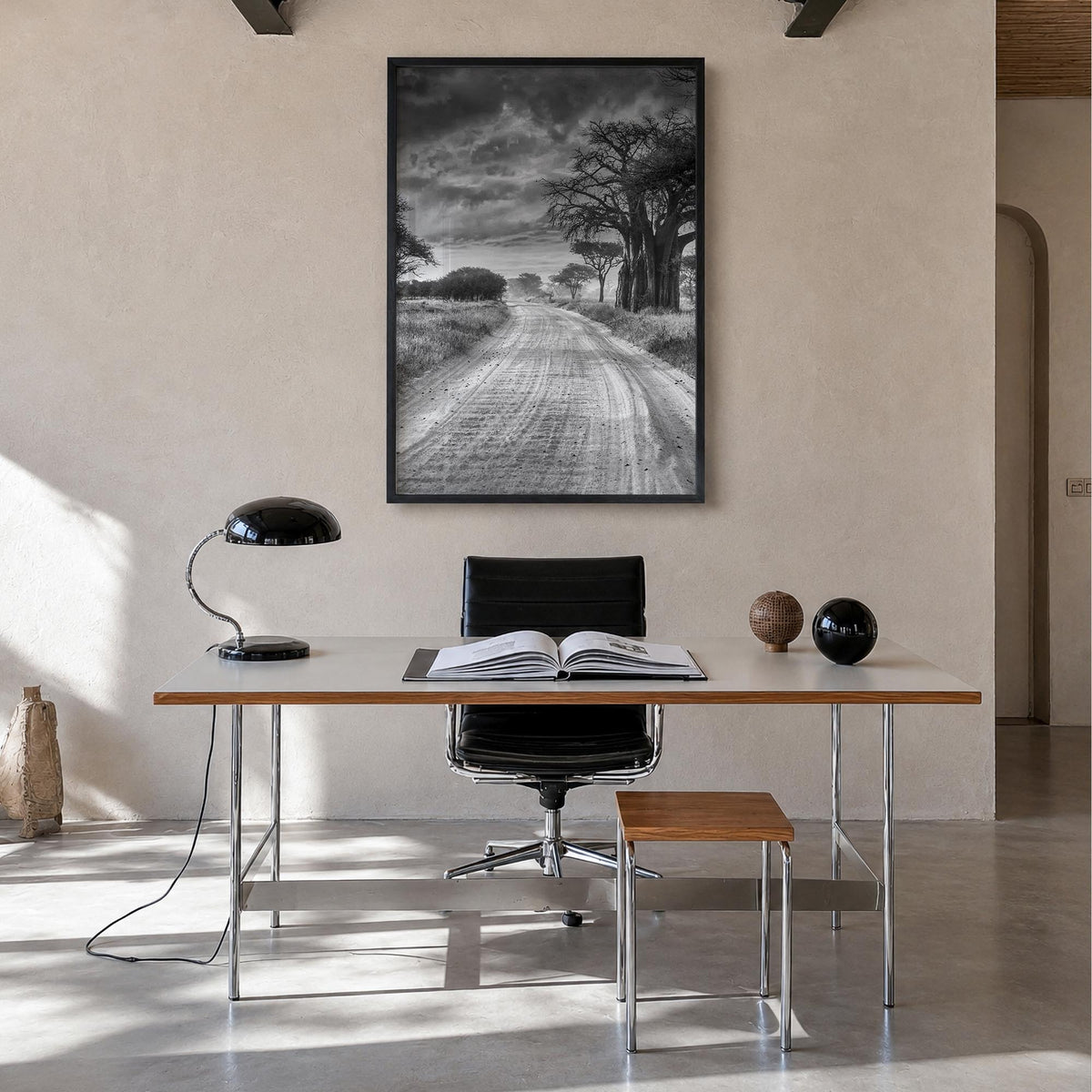 Tanzania black & white photo poster of Africa – vertical wall art in black wood frame, hanging on wall