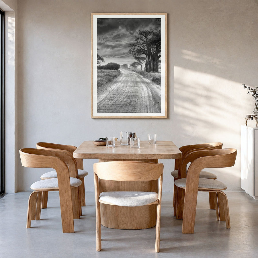 Tanzania Photo Poster in a natural wood frame, hanging in a dining room, white border