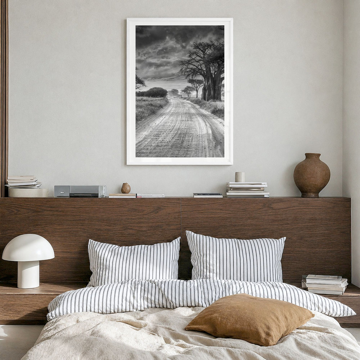 Tanzania Photo Poster in a white wood frame, hanging in a bedroom, white border