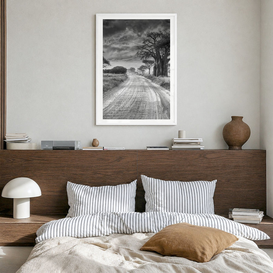 Tanzania Photo Poster in a white wood frame, hanging in a bedroom, white border