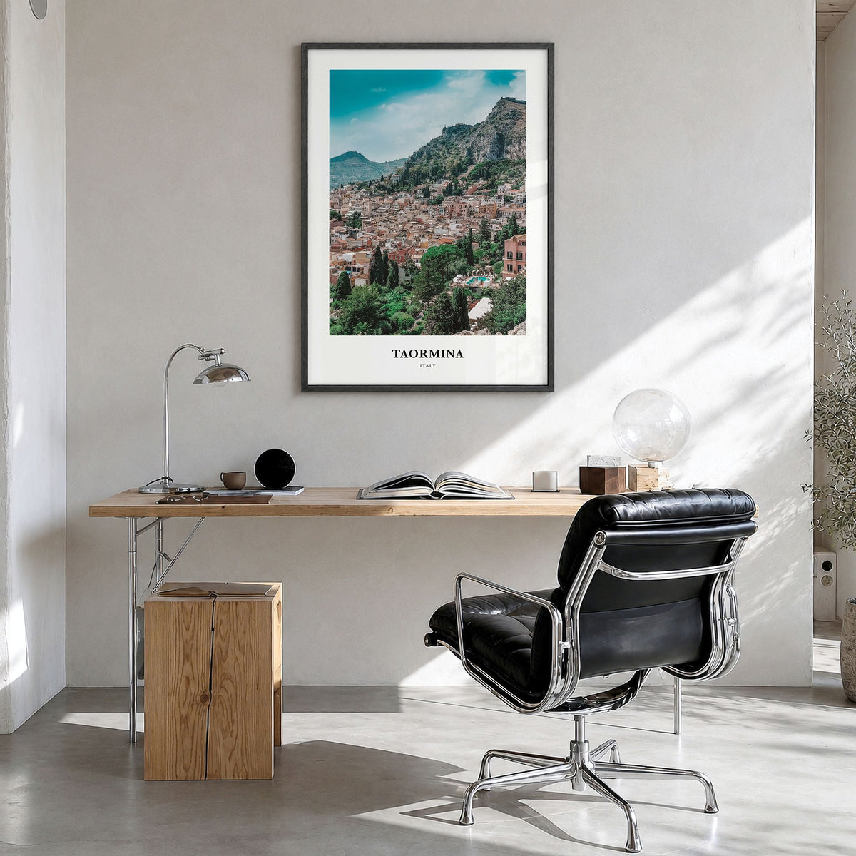 Taormina Classic Poster in a black wood frame, hanging in a bright home office