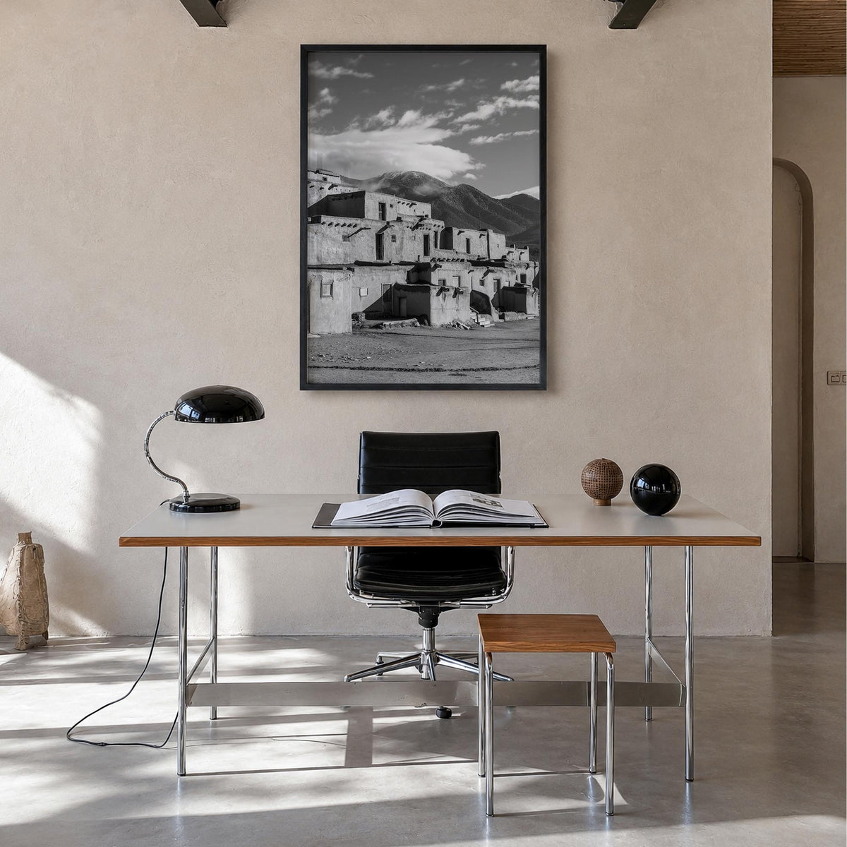 Taos black & white photo poster of New Mexico, USA – vertical wall art in black wood frame, hanging on wall