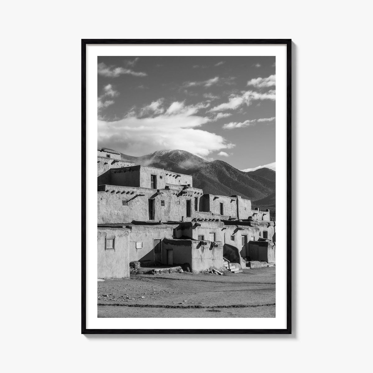 Taos black & white photo poster of New Mexico, USA – vertical wall art, unframed print shown in interior mockup