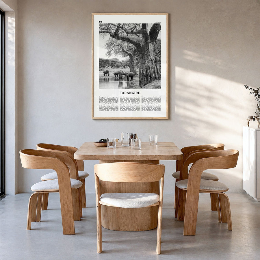 Tarangire National Park Newspaper Poster in a natural wood frame, hanging in a dining room