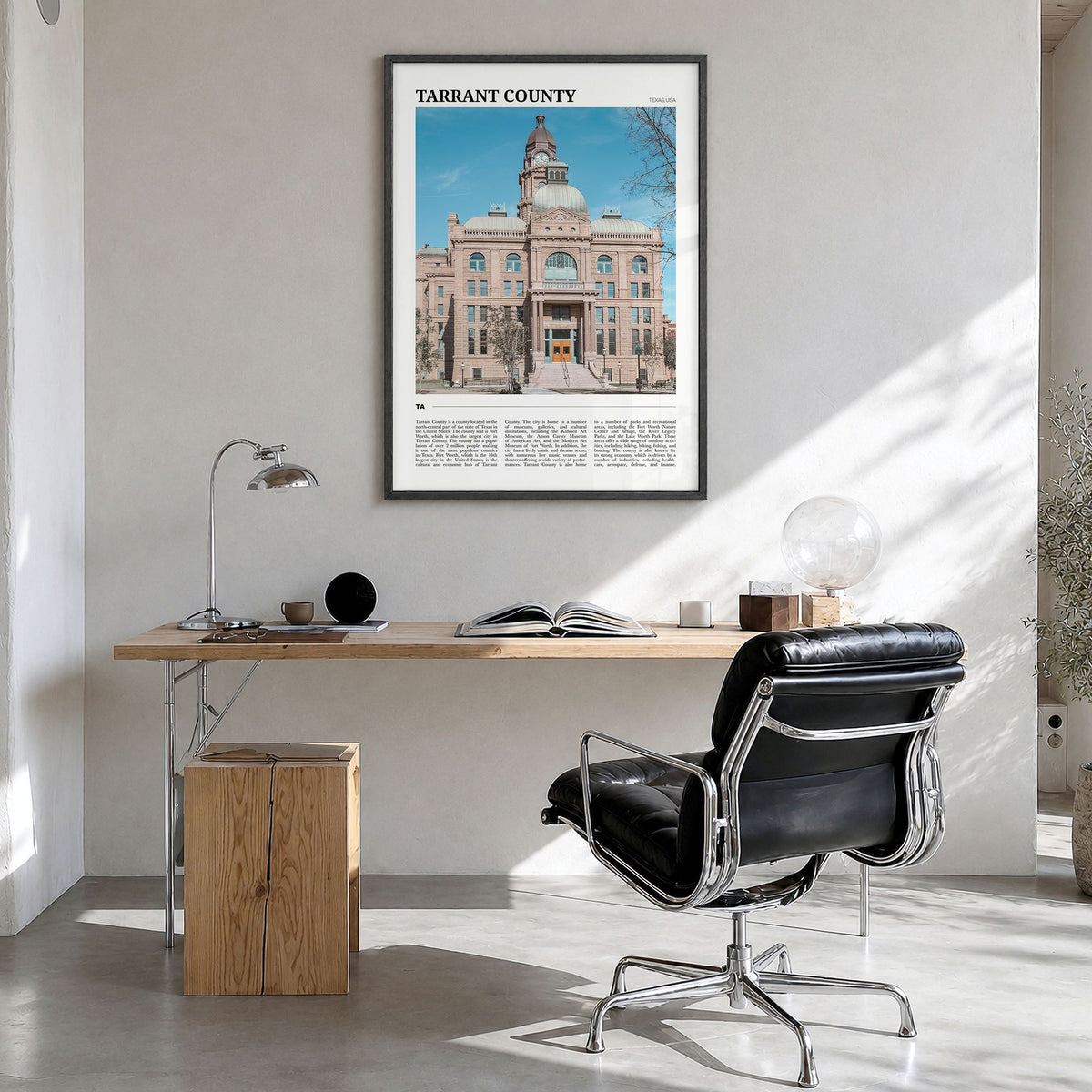 Tarrant County Travel Poster in a black wood frame, hanging in a bright home office