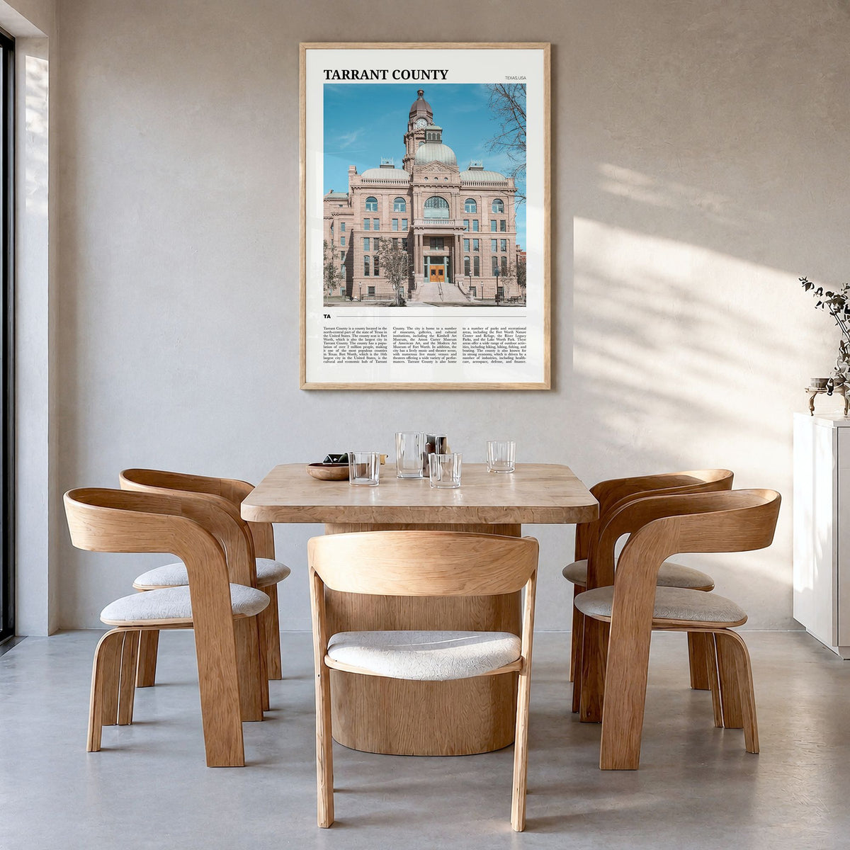 Tarrant County Travel Poster in a natural wood frame, hanging in a dining room