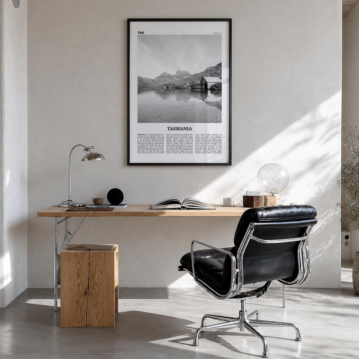 Tasmania no. 2 black & white newspaper poster of Australia – vertical wall art in black wood frame, hanging on wall