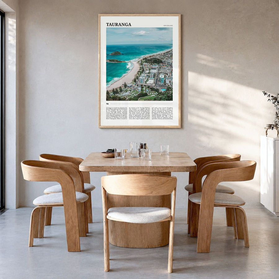 Tauranga Travel Poster in a natural wood frame, hanging in a dining room
