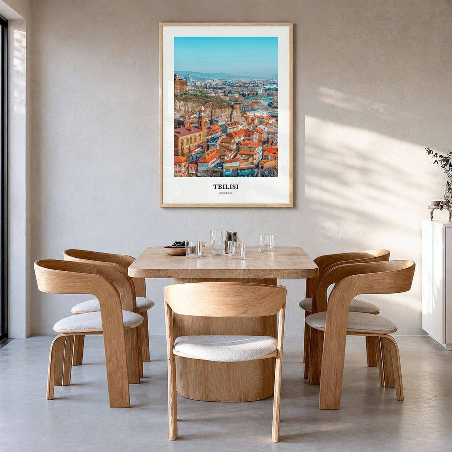 Tbilisi Classic Poster in a natural wood frame, hanging in a dining room