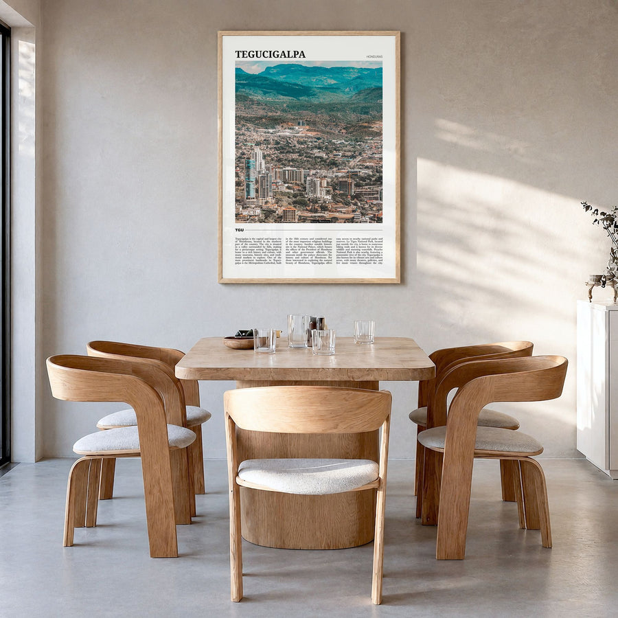 Tegucigalpa Travel Poster in a natural wood frame, hanging in a dining room