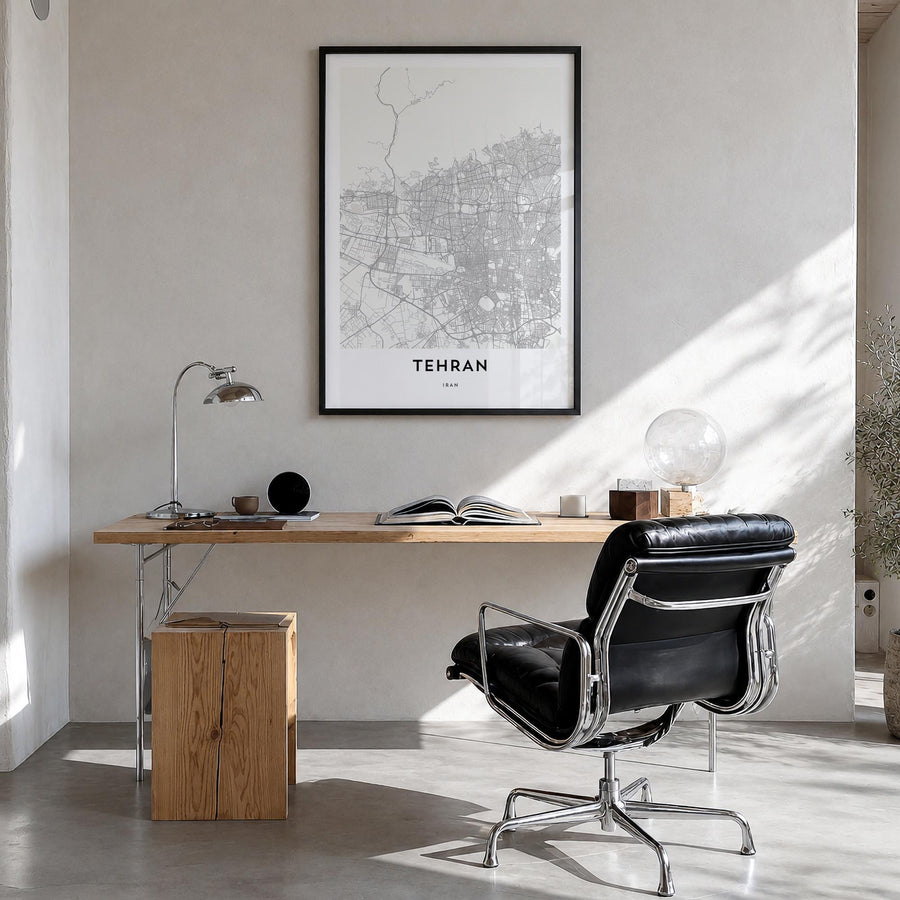Tehran black & white map poster of Iran – vertical wall art in black wood frame, hanging on wall