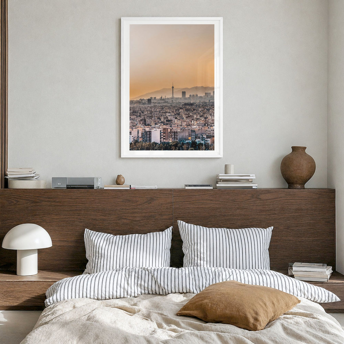 Tehran Photo Poster in a white wood frame, hanging in a bedroom, white border