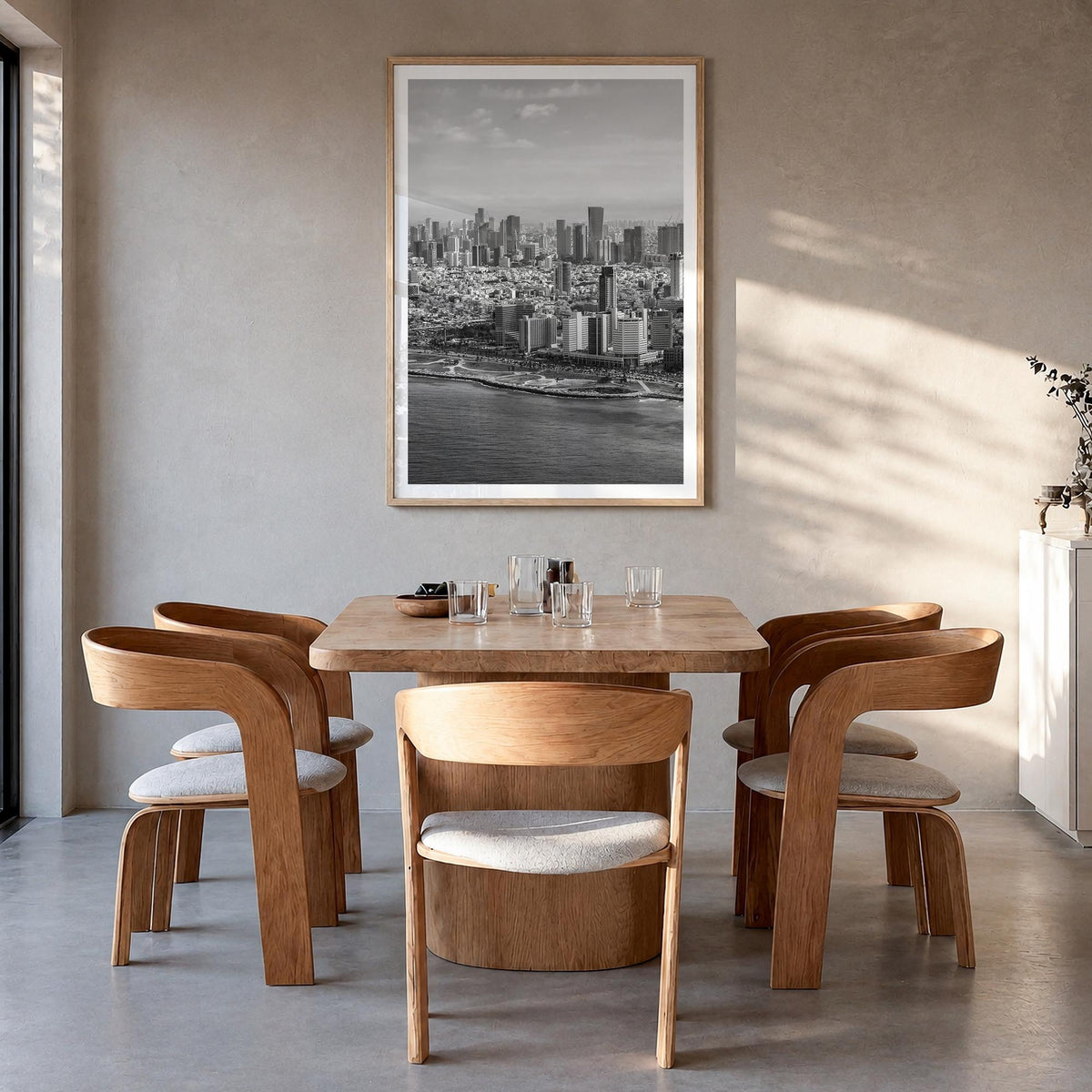 Tel Aviv no. 1 black & white photo poster of Israel – vertical wall art in natural wood frame with white border, hanging on w
