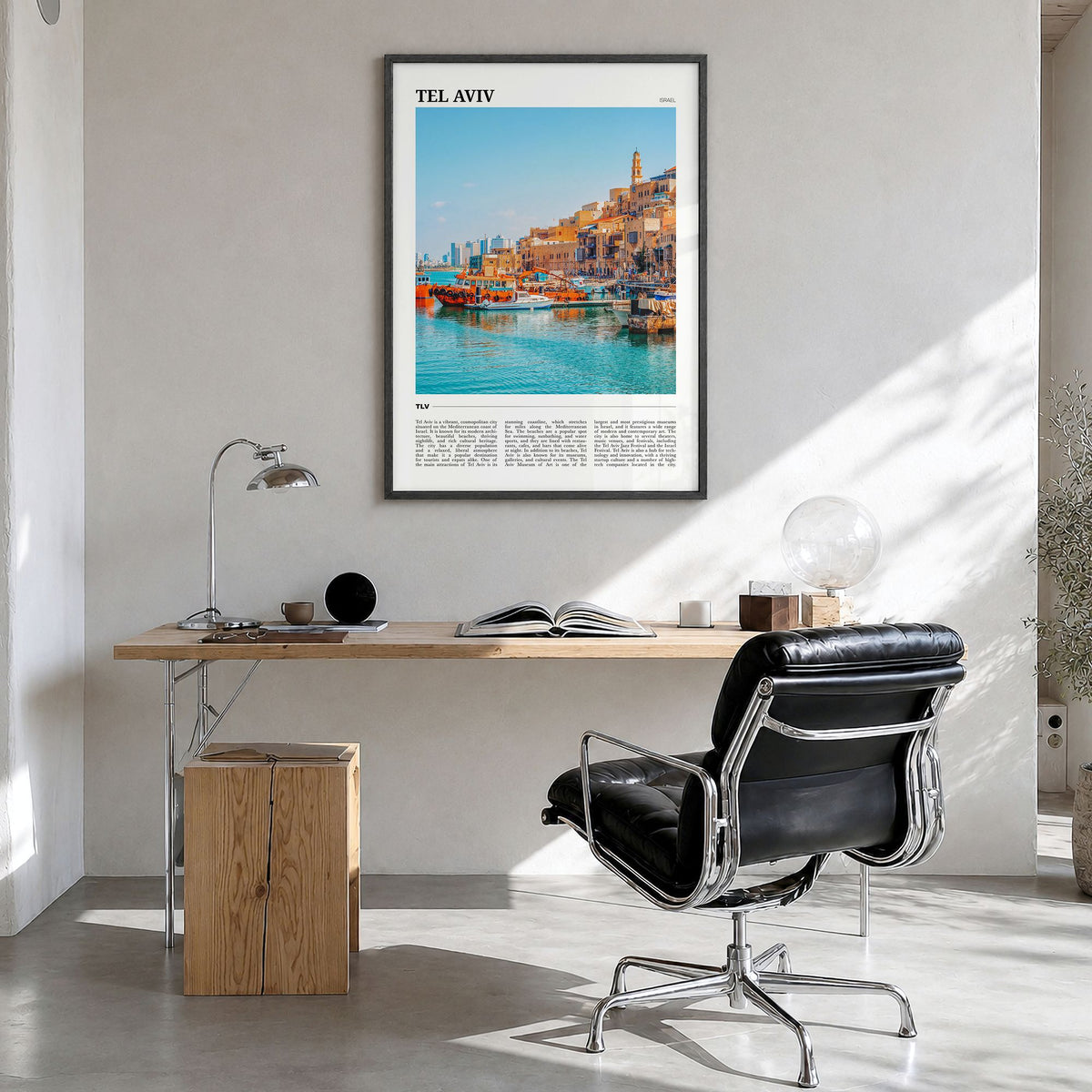 Tel Aviv Travel Poster in a black wood frame, hanging in a bright home office