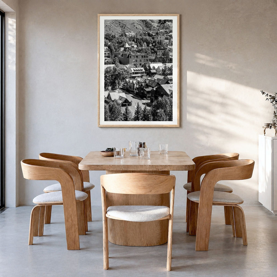 Telluride Photo No 1 Poster in a natural wood frame, hanging in a dining room, white border