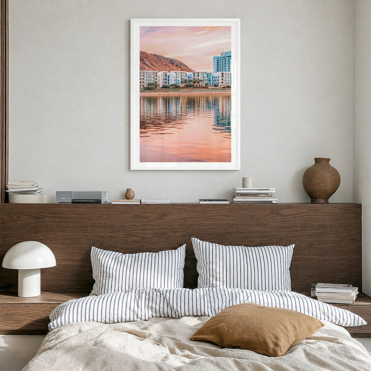 Tempe Photo Poster in a white wood frame, hanging in a bedroom, white border