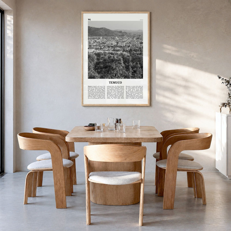 Temuco Newspaper Poster in a natural wood frame, hanging in a dining room